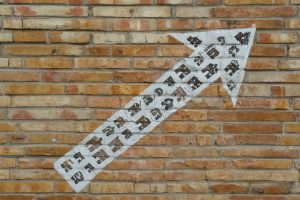 shutterstock_AI-arrow-pointing-upward-on-wall-300x200.jpg